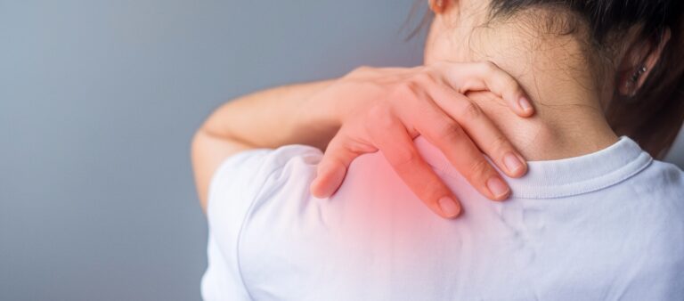 A person experiencing chronic neck pain and tension, illustrating the stress-pain cycle.